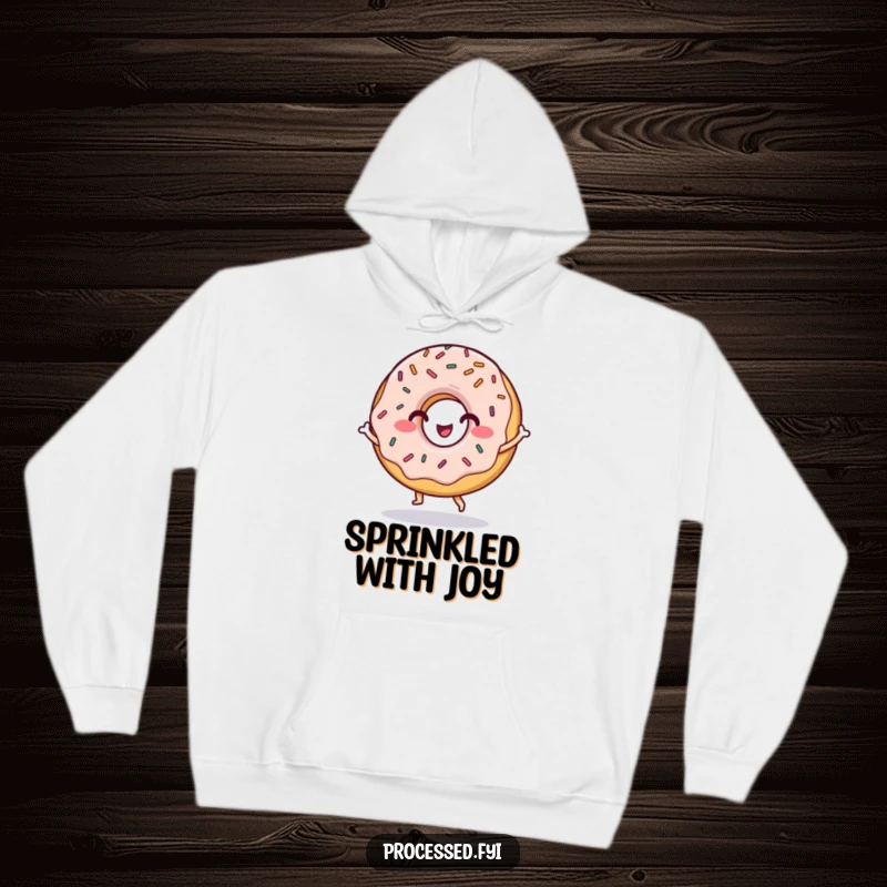 Funny hoodie depicting a grinning donut character with sprinkles, happily dancing, perfect for cozying up with sweetness.